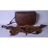 A VINTAGE HUNTING BAG, containing belt and accessories.