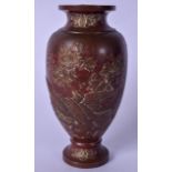 AN EARLY 20TH CENTURY JAPANESE SPELTER VASE, decorated in relief with birds amongst foliage .16 cm.