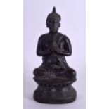 AN UNUSUAL 19TH CENTURY CHINESE BRONZE FIGURE OF A SEATED BUDDHA modelled with hands clasped upon