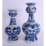 TWO LARGE 18TH CENTURY DELFT BLUE AND WHITE VASES painted with flowers. 31 cm & 27 cm high. (2)