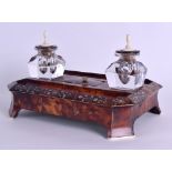 AN EARLY 19TH CENTURY REGENCY TORTOISESHELL AND MOTHER OF PEARL DESK STAND decorated with
