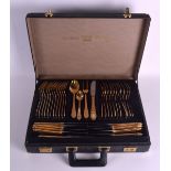 A CASED SEVENTY PIECE SET OF GOLD PLATED SOLINGEN CUTLERY with beaded border handles. (70)