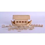 A RARE 19TH CENTURY CONTINENTAL IVORY AND BONE NOAHS ARK with animals. Ark 16 cm wide.