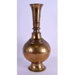 AN 18TH/19TH CENTURY MIDDLE EASTERN BRASS BULBOUS VASE of plain form with splayed foot. 38 cm x 15