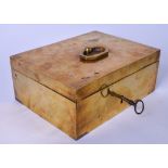 A HEAVY BRASS BOX WITH OCTAGONAL HANDLE, complete with original key. 20 cm wide.