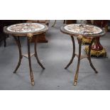 A PAIR OF TRI LEGGED MARBLE TOP SPECIMEN TABLES, formed with Louis XVI style bronze ram head