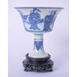 A CHINESE BLUE AND WHITE PORCELAIN STEM CUP BEARING WANLI MARKS, painted with figures and animals in