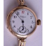 A VINTAGE 9CT GOLD AMERICAN WALTHAM LADIES WRISTWATCH with yellow metal strap. 22.6 grams overall.