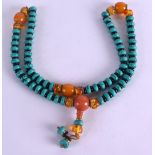 A CHINESE SINO TIBETAN AMBER TURQUOISE AND WHITE METAL BUDDHIST NECKLACE. 68 cm long.