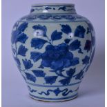 A CHINESE BLUE AND WHITE PORCELAIN VASE OR JAR, hand painted with mythical beasts amongst foliage.