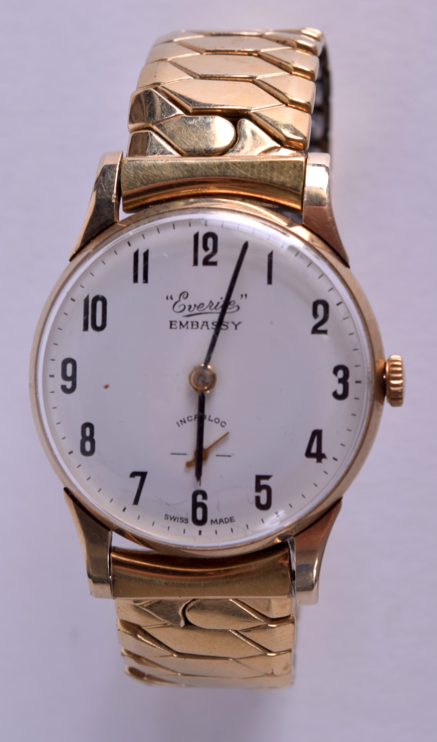 A VINTAGE YELLOW METAL EMBASSY INCABLOCK WRISTWATCH with rolled gold strap. 3 cm diameter.