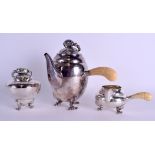 A LOVELY ARTS AND CRAFTS GEORG JENSEN & WENDELAIS SILVER TEASET with fruiting terminals and carved