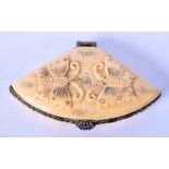 A MID 20TH CENTURY CHINESE BONE FAN SHAPED BOX, carved in relief with opposing butterflies. 6.6 cm