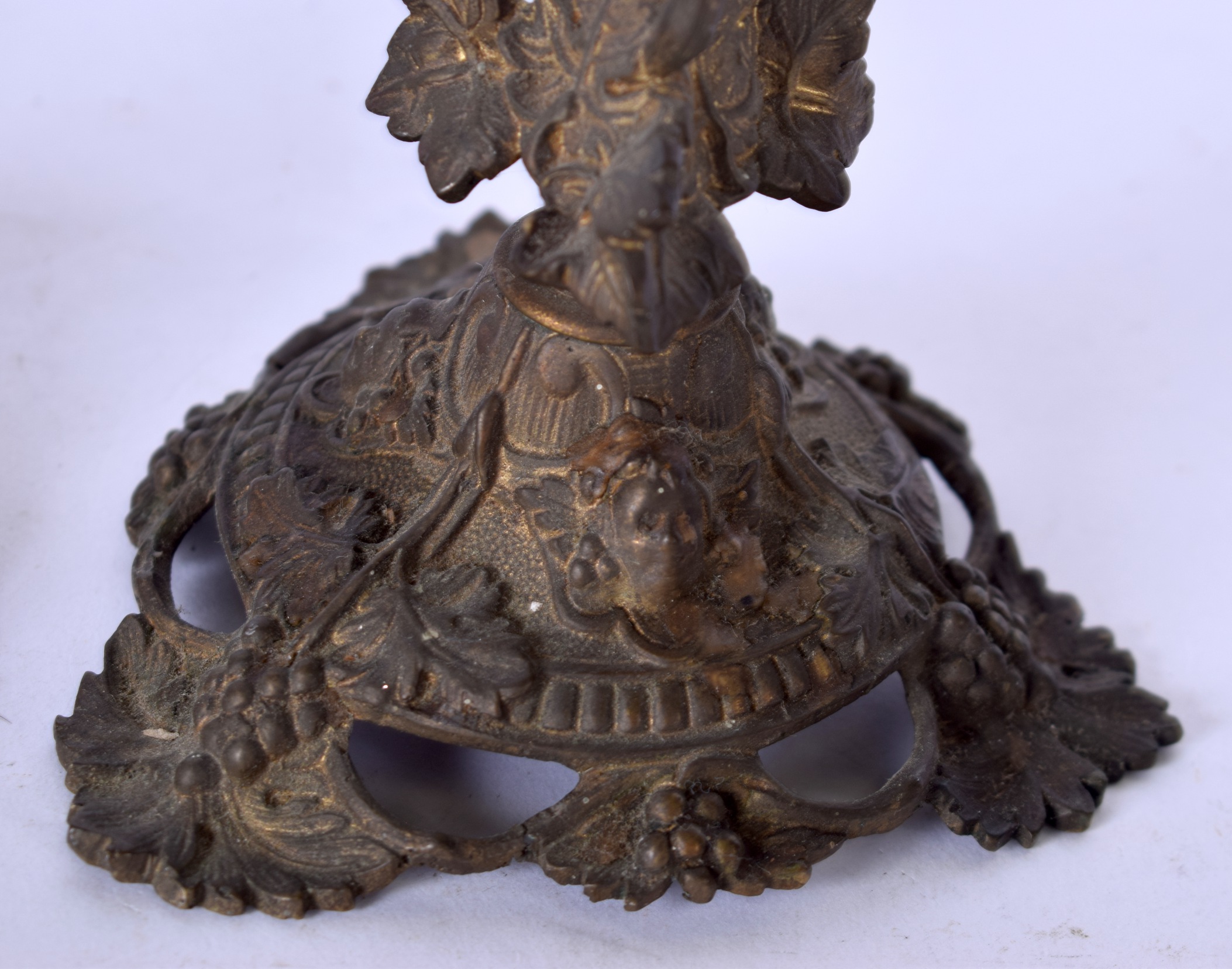 A PAIR OF BRONZE CANDLESTICKS, the feet in the form of fruiting vines. 23 cm high. - Image 3 of 3