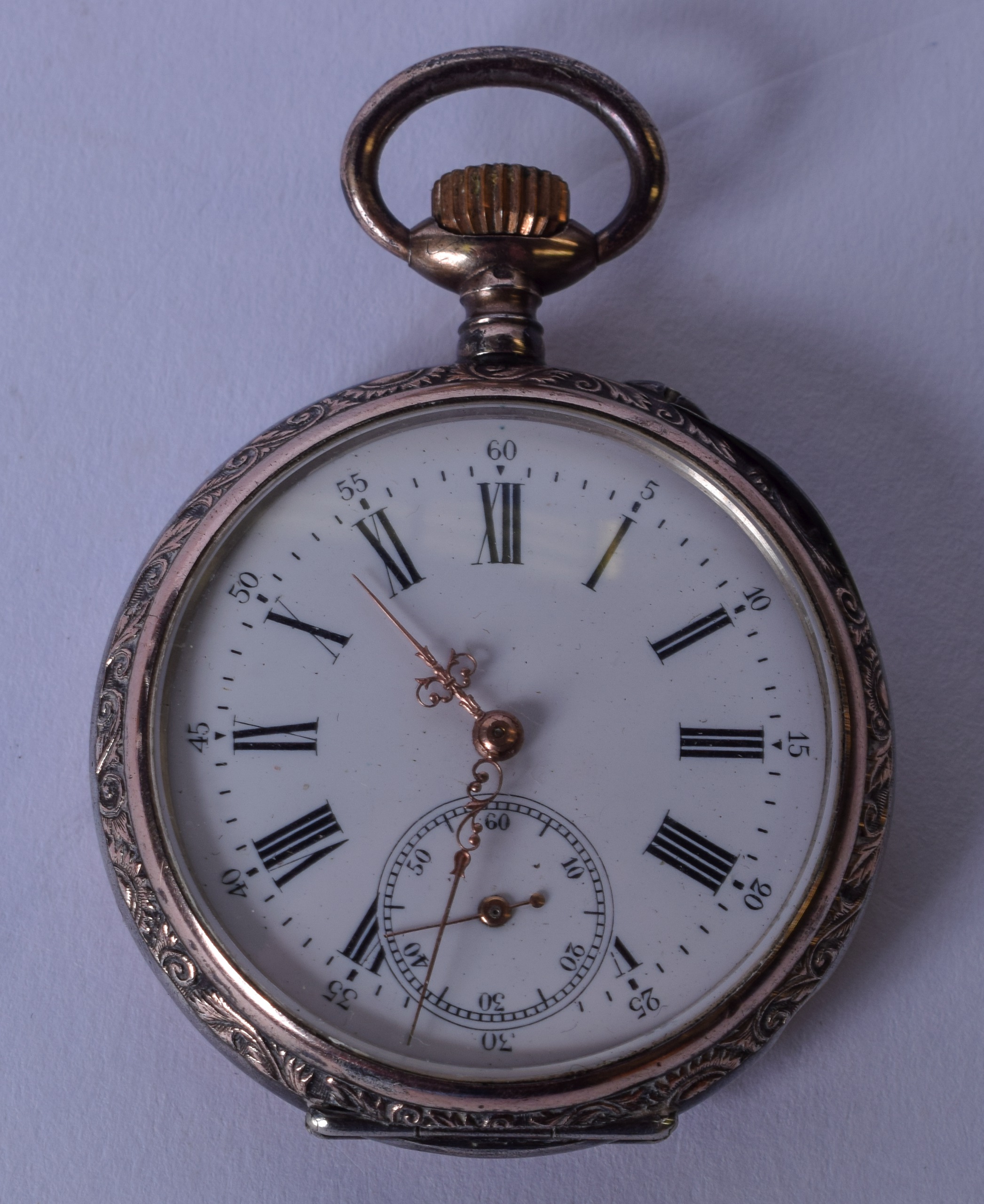 AN EARLY 20TH CENTURY SOLID SILVER POCKET WATCH, inner case stamped Sheffield marks, with white