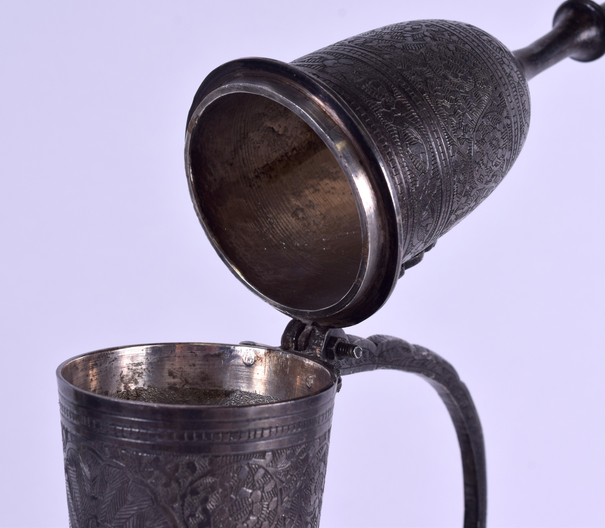 A LARGE 19TH CENTURY MIDDLE EASTERN TINNED WHITE METAL EWER decorated with script, foliage and - Image 4 of 4