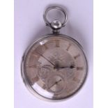AN ANTIQUE SILVER POCKET WATCH with engraved foliate dial. 4.5 cm diameter.