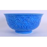 A 19TH CENTURY CHINESE BLUE GLAZED PORCELAIN BOWL bearing Qianlong marks to base, decorated in