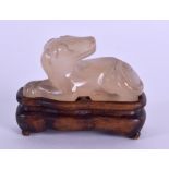 A GOOD 19TH CENTURY CHINESE CARVED AGATE FIGURE OF A HOUND Qing, modelled with recumbent with his