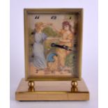 AN EARLY 20TH CENTURY SWISS BRASS IVORY AND ENAMEL AUTOMATON CLOCK C1920 painted with two figures