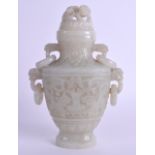 A GOOD 19TH CENTURY CHINESE CARVED GREENISH WHITE JADE VASE AND COVER Qing, decorated with mask