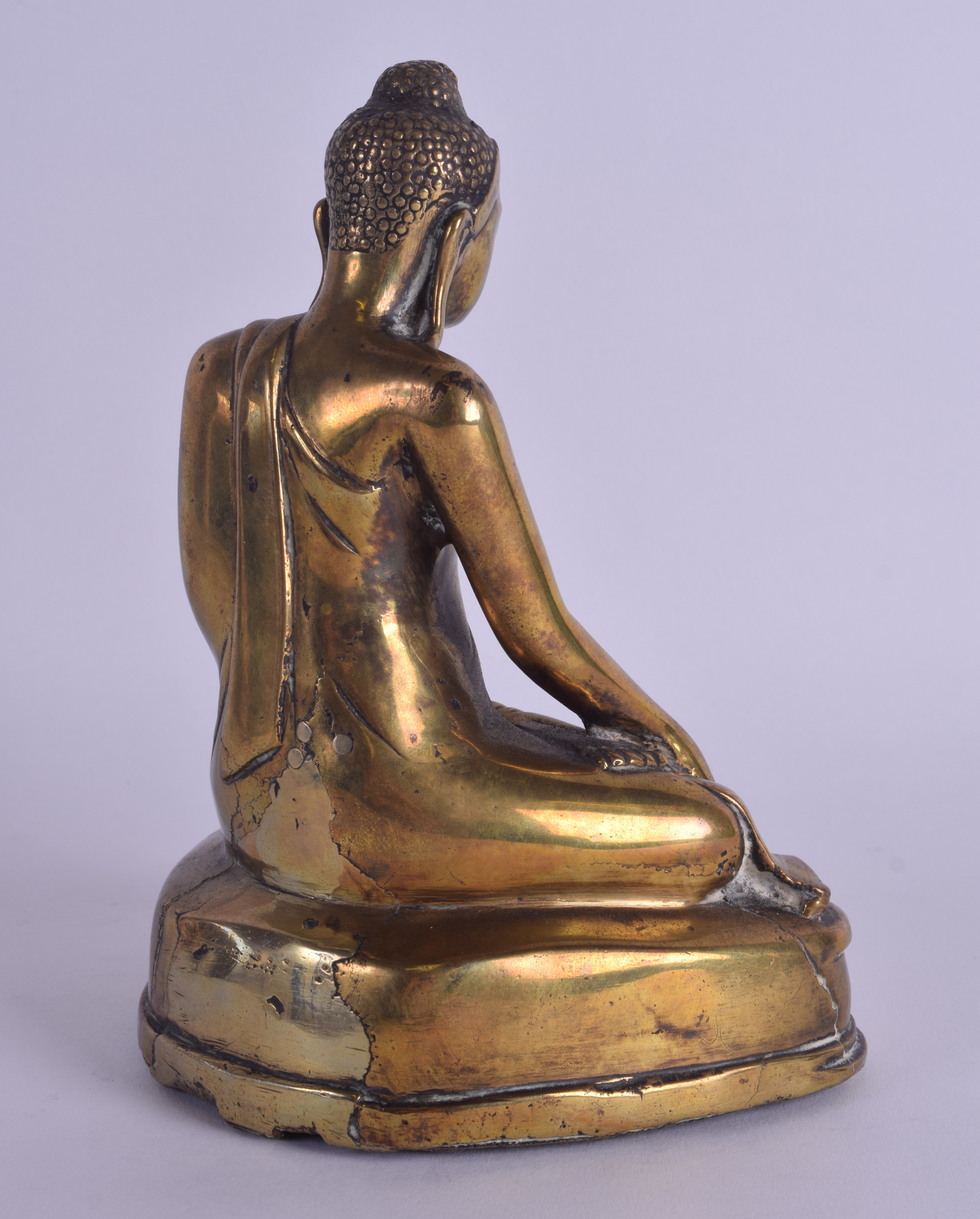 A 17TH CENTURY TIBETAN CHINESE ASIAN BRONZE FIGURE OF A BUDDHA modelled in robes upon a triangular - Image 3 of 4