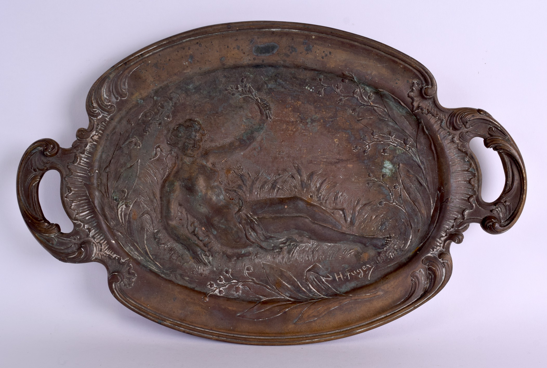 A 19TH CENTURY FRENCH ART NOUVEAU TWIN HANDLED BRONZE DISH decorated with a reclining female holding