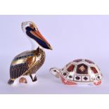 TWO ROYAL CROWN DERBY IMARI PAPERWEIGHTS in the form of a tortoise & a brown pelican. (2)
