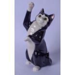 A CATS & CO PORCELAIN FIGURE OF A CAT, modelled on its hind legs with a paw in the air. 28.5 cm.