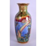 A RARE WEDGWOOD FAIRYLAND LUSTRE PORCELAIN VASE by Daisy Makeig Jones, painted pixies and mythical