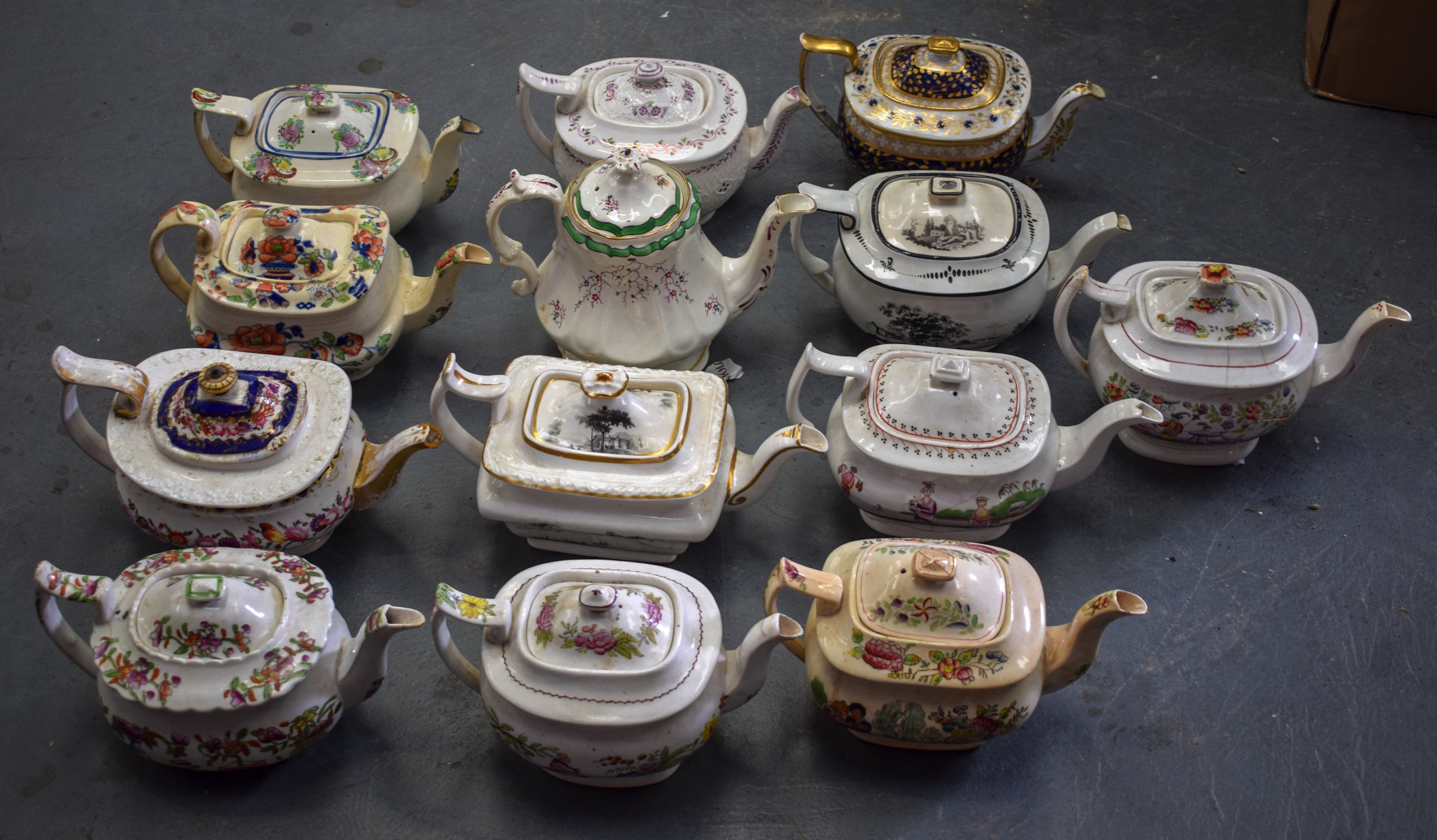 A GROUP OF THIRTEEN ENGLISH TEA POTS, of varying factory and style.(13)