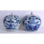A LARGE PAIR OF 19TH CENTURY CHINESE BLUE AND WHITE GINGER JAR AND COVER Qing, painted with floral