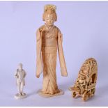 AN EARLY 20TH CENTURY JAPANESE BONE OKIMONO IN THE FORM OF A STANDING GEISHA, together with an