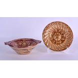 AN EARLY HISPANO MORESQUE TIN GLAZED BOWL together with a matching saucer. 14 cm & 12 cm wide. (2)