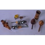 A VINTAGE WOODEN CARVED BOTTLE STOPPER, together with vintage optics, treen etc. (7)