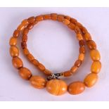 AN EARLY 20TH CENTURY BUTTERSCOTCH AMBER NECKLACE.12 grams. 30 cm long.