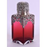 AN EDWARDIAN SILVER MOUNTED RUBY GLASS SCENT BOTTLE. Birmingham 1900. 13.5 cm high.