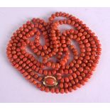 AN 18CT GOLD AND RED CORAL NECKLACE with coral inset clasp. 88 grams. 140 cm long.