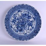A MID 19TH CENTURY CHINESE BLUE AND WHITE PORCELAIN DISH bearing Qianlong marks to base, painted