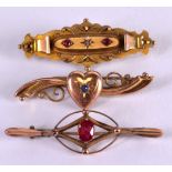 THREE ANTIQUE 9CT GOLD BROOCHES. 6.4 grams. (3)