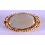 A GOOD VICTORIAN 15CT GOLD AND OPAL BROOCH. 6.9 grams. Overall 3.5 cm, oval 2.5 cm wide.