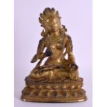 A CHINESE TIBETAN GILT BRONZE FIGURE OF A BUDDHA modelled upon a triangular lotus base. 19 cm x 12