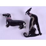 TWO SILVER AND ENAMEL DOG BROOCHES. (2)