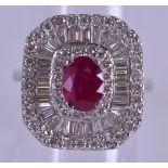 AN 18CT GOLD RUBY AND DIAMOND DRESS RING. Size O.