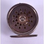 A RARE ENGLISH SILVER HALLMARKED FISHING REEL. 3.25 cm wide.