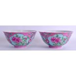 A PAIR OF CHINESE FAMILLE ROSE PORCELAIN BOWLS 20th Century, bearing Kangxi marks to base, painted