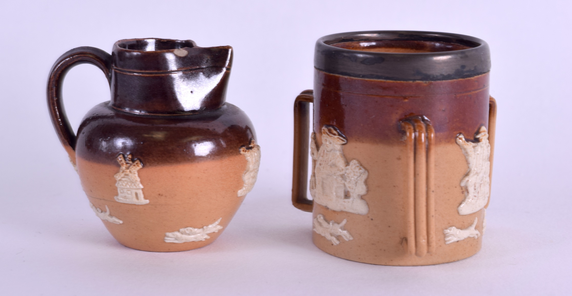 A MINIATURE DOULTON LAMBETH STONEWARE TYG together with another miniature Doulton jug. 4.25 cm high. - Image 2 of 3