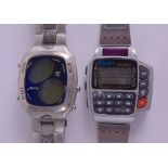 TWO VINTAGE STAINLESS STEEL DIGITAL WRISTWATCHES. (2)