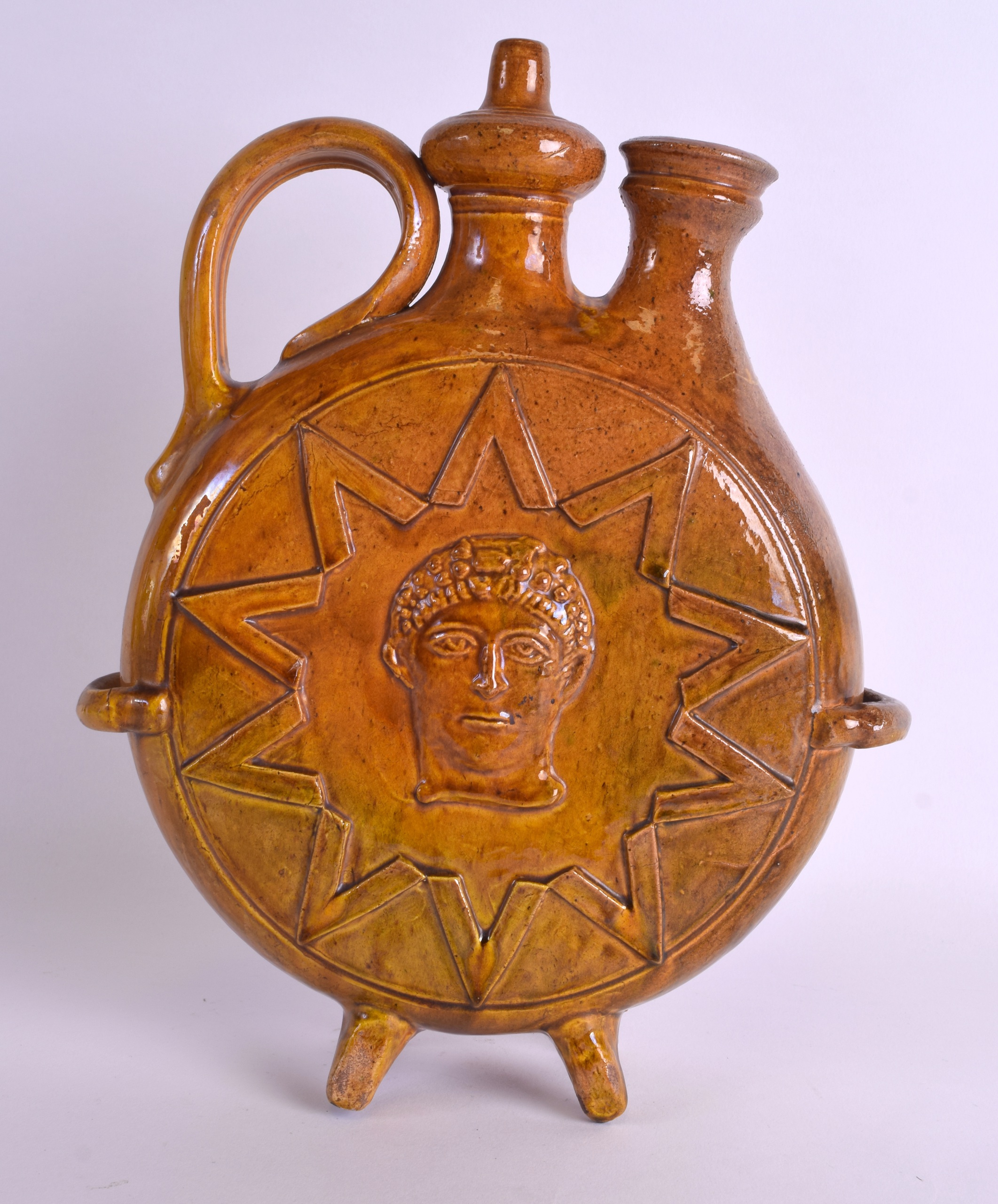 A LARGE 19TH CENTURY CONTINENTAL YELLOW GLAZED POTTERY EWER decorated with a Roman mask head - Image 2 of 3