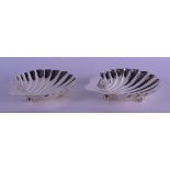 A PAIR OF SILVER SHELL SHAPED BON BON DISHES. Sheffield 1926 & 1934. 4.1 oz. 12 cm x 10 cm.